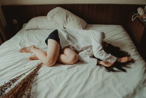 girl lying in a bed