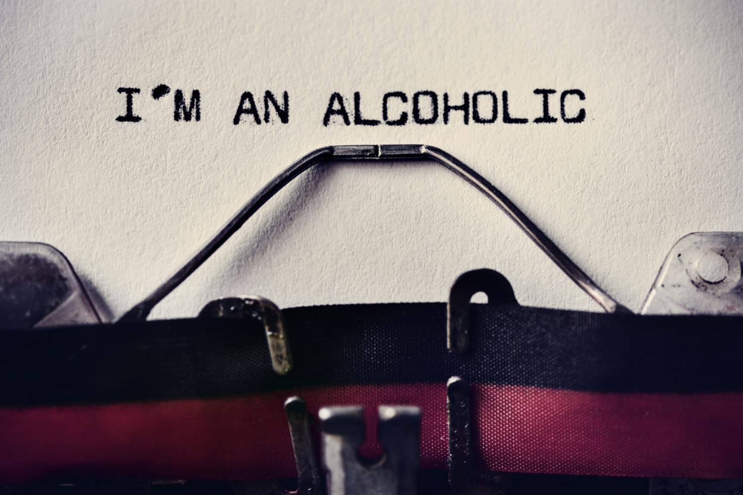 typewriter and text I am an alcoholic